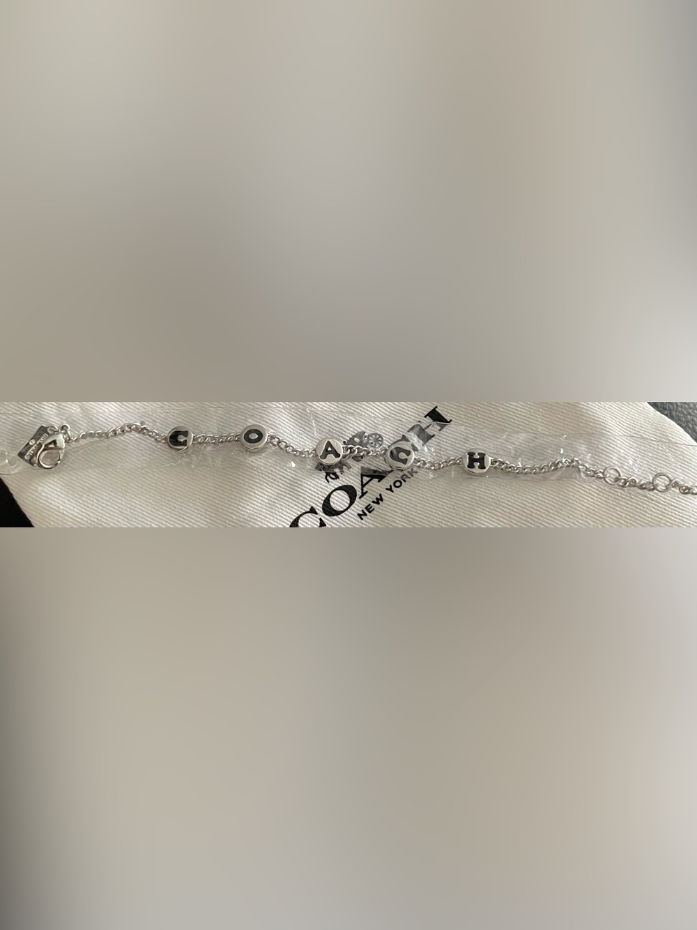 Coach Silver Letter Charm Bracelet with Signature Accent